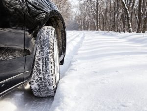 Car Driving Through Snow